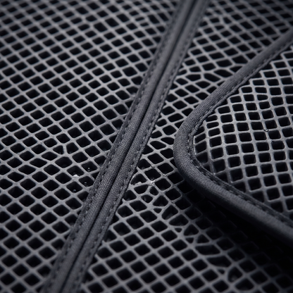Macro of the Joobello waterproof pet mat raised diamond-honeycomb textured surface and edge binding